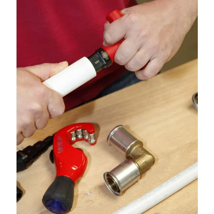 Uponor Calibrador-escariador MLC 63, para el abocardado de las tuberías  multicapa Uni Pipe Plus y MLC, maneral incorporado, color rojo (referencia  1014339) Estándar : : Bricolaje y herramientas